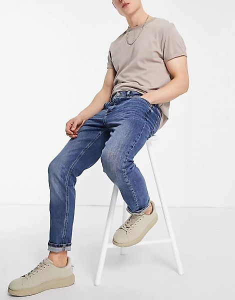 River Island – Eng geschnittene Jeans in Blau günstig online kaufen