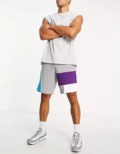 ASOS DESIGN – Oversize-Shorts aus Jersey mit Patchwork-Blockfarbendesign, K günstig online kaufen
