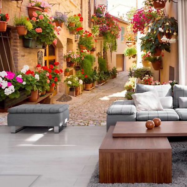 artgeist Fototapete The Alley in Spello (Italy) mehrfarbig Gr. 150 x 105 günstig online kaufen