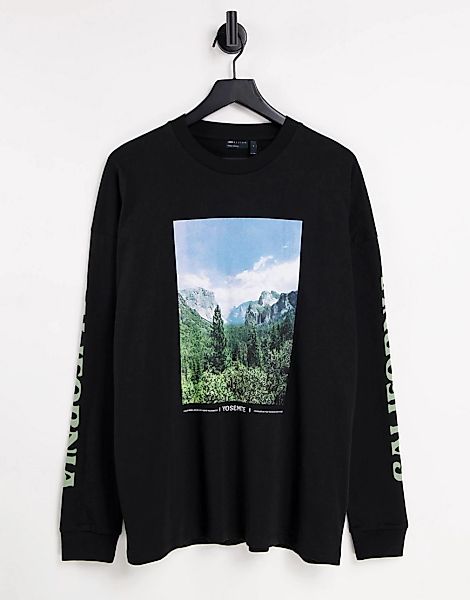 ASOS DESIGN – Langärmliges Oversize-Shirt in Schwarz mit Berg- und Ärmelpri günstig online kaufen
