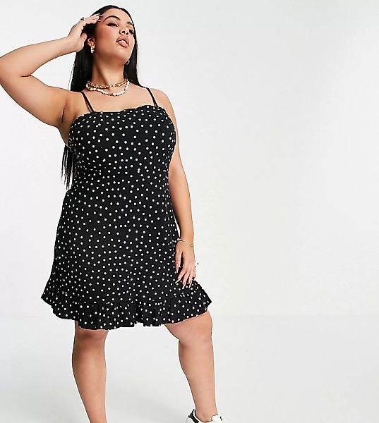 ASOS DESIGN Curve – Gepunktetes Sommerkleid in Schwarz-Weiß mit Schößchensa günstig online kaufen