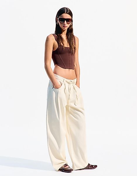 Bershka Fließende Hose Mit Bundfalten Damen 40 Beige günstig online kaufen