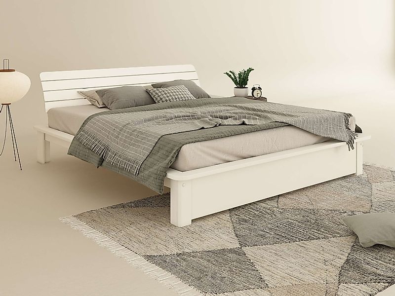 OTTO home Massivholzbett "Antri, Futonbett, ergonomisch geformtes Kopfteil, günstig online kaufen