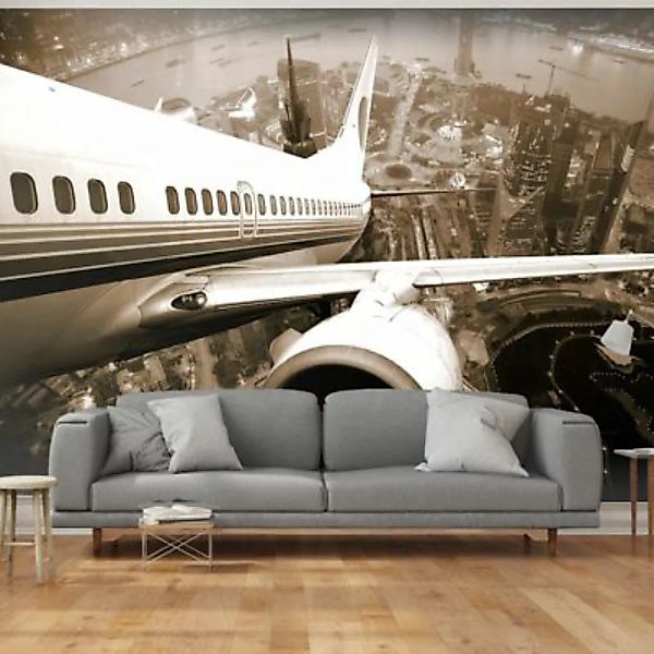 artgeist Fototapete Flugzeug beim Start über der Stadt sand Gr. 250 x 193 günstig online kaufen
