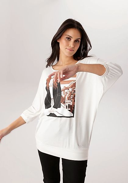 Aniston SELECTED Fledermausshirt mit flächendeckendem, femininen Frontmotiv günstig online kaufen