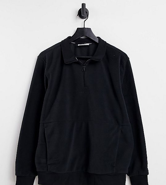 Calvin Klein – Mit Polarfleece gefüttertes Sweatshirt in Schwarz mit halbla günstig online kaufen