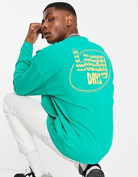 ASOS DESIGN – Langärmliges Oversize-Shirt in Grün mit Grafikprint auf dem R günstig online kaufen