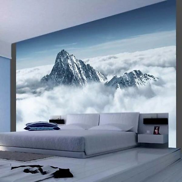 artgeist Fototapete Bergspitze in den Wolken mehrfarbig Gr. 350 x 270 günstig online kaufen
