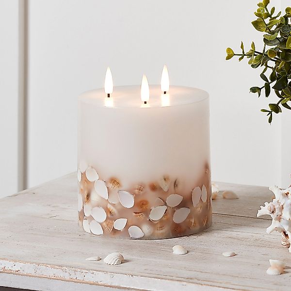 TruGlow® dreidochtige LED Kerze Echtwachs mit Muscheln günstig online kaufen