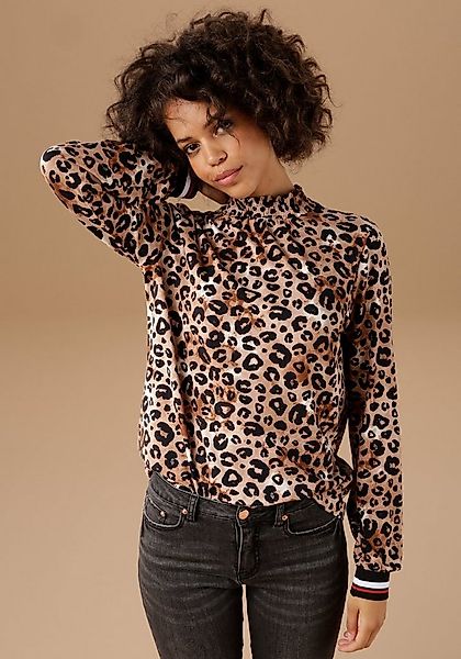 Aniston CASUAL Langarmshirt mit trendigem Animal-Print und gestreiften Bünd günstig online kaufen