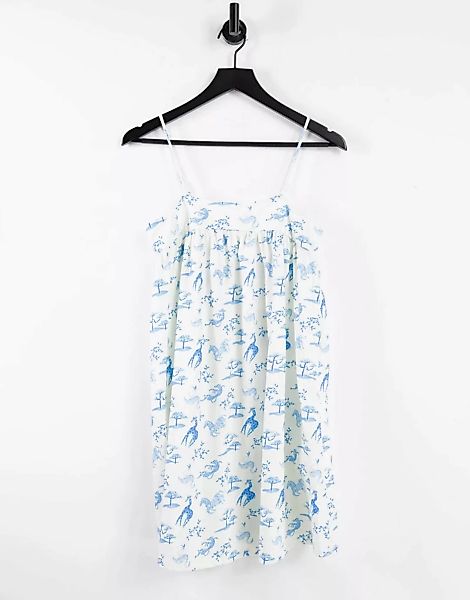 ASOS DESIGN – Mini-Sommerkleid in Creme mit gesmokter Naht und blauem Tierp günstig online kaufen