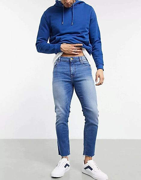 ASOS DESIGN – Kurz geschnittene, ungesäumte, enge Jeans in dunkler Vintage- günstig online kaufen