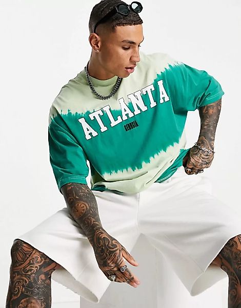 ASOS DESIGN – Oversize-T-Shirt mit grünem Batikmuster und „Atlanta“-Citypri günstig online kaufen