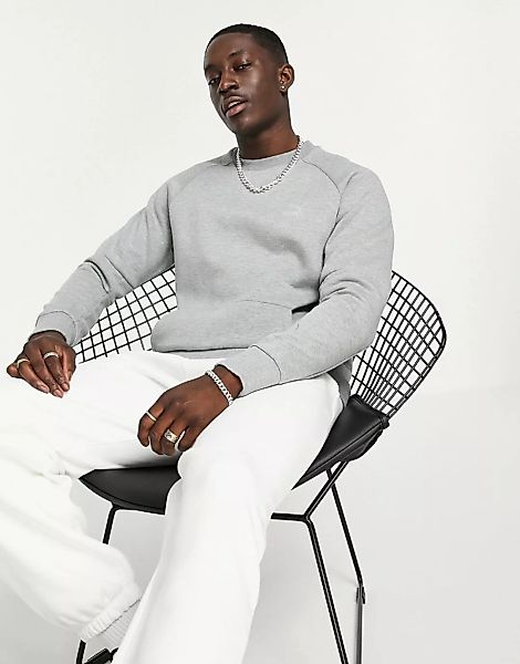 PUMA – Classics Tech – Sweatshirt in Grau günstig online kaufen