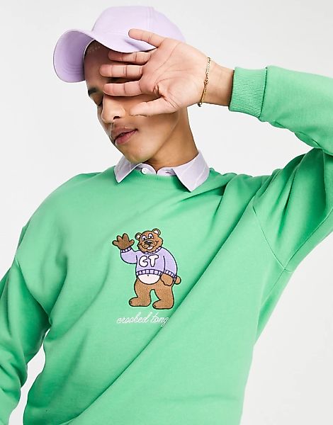 Crooked Tongues – Sweatshirt in Grün mit Rundhalsausschnitt und Winkender-B günstig online kaufen