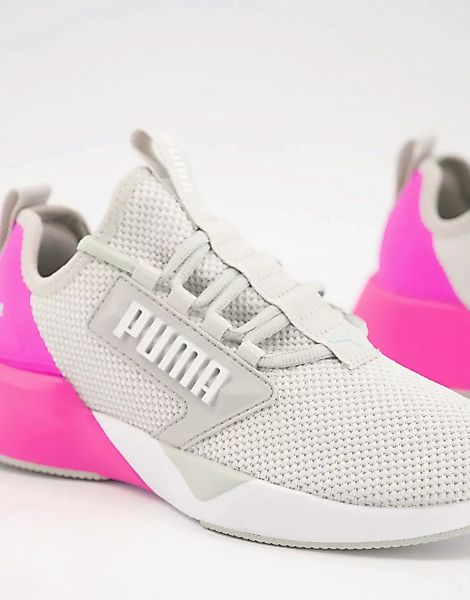 Puma – Training Retaliate – Sneaker in Grau und Rosa für Damen günstig online kaufen