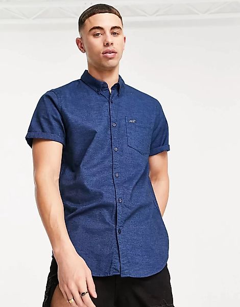 Hollister – Kurzärmliges, schmal geschnittenes Hemd mit Logo in Marineblau günstig online kaufen