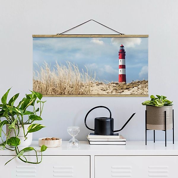 Stoffbild Strand mit Posterleisten - Querformat Leuchtturm in den Dünen günstig online kaufen