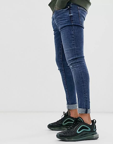 River Island – Spray-on-Jeans aus Denim in mittlerer Waschung-Blau günstig online kaufen