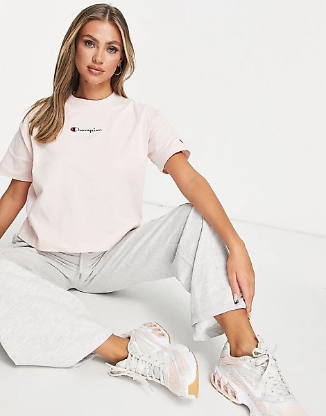 Champion – Kastiges T-Shirt in Rosa mit kurzem Schnitt und kleinem Logo günstig online kaufen