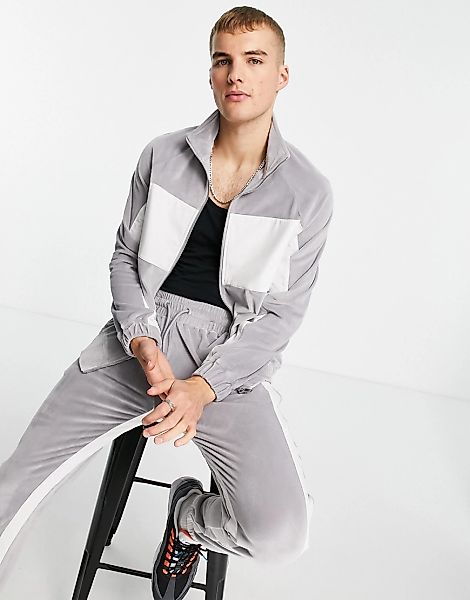 Topman – Trainingsjacke aus Velours in Grau mit Blockfarbendesign, Reißvers günstig online kaufen