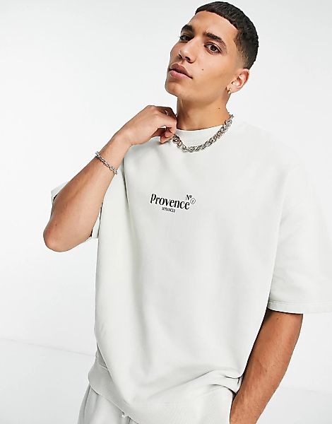 ASOS DESIGN – Kurzärmliges Oversize-Sweatshirt in weißer Waschung mit Stadt günstig online kaufen