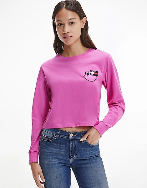 Tommy Jeans – Langärmliges Oberteil in Rosa mit Smiley-Logo günstig online kaufen