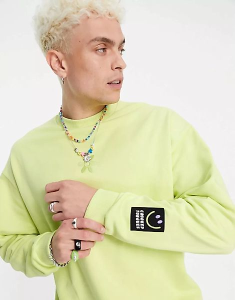 Crooked Tongues – Sweatshirt mit Blumenlogo und Logoaufnäher in Grün, Kombi günstig online kaufen