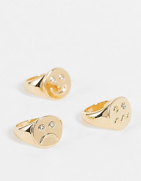ASOS DESIGN – 3er-Set goldfarbene Ringe mit unterschiedlichen Smiley-Verzie günstig online kaufen