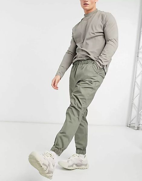 ASOS DESIGN – Schmal zulaufende Jogginghose im Chino-Stil mit elastischem B günstig online kaufen