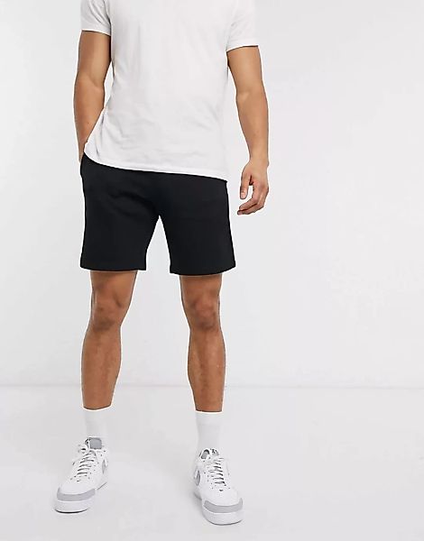 ASOS DESIGN – Schmale Shorts aus Jersey in Schwarz günstig online kaufen