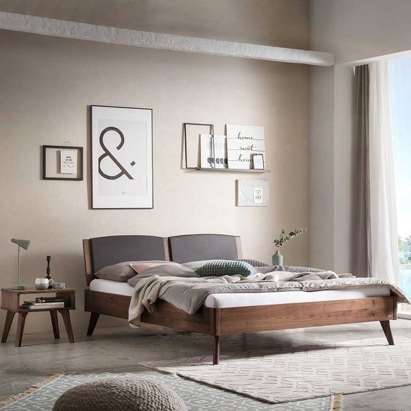 Doppelbett mit Polster Kopfteil aus Nussbaum Massivholz optionale Nachtkons günstig online kaufen