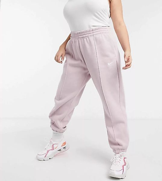Nike Plus – Oversize-Jogginghose mit kleinem Swoosh-Logo in Hellrosa günstig online kaufen