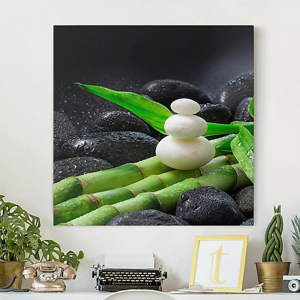 Leinwandbild Weiße Steine auf Bambus günstig online kaufen