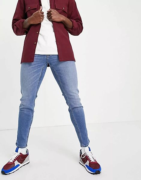 Hollister – Jeans mit superengem Schnitt in heller, mittlerer Waschung-Blau günstig online kaufen