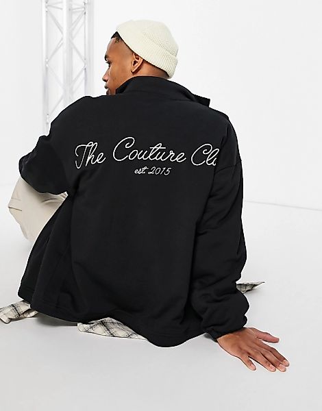 The Couture Club – Reißverschlussjacke in Schwarz mit Logoprint hinten und günstig online kaufen