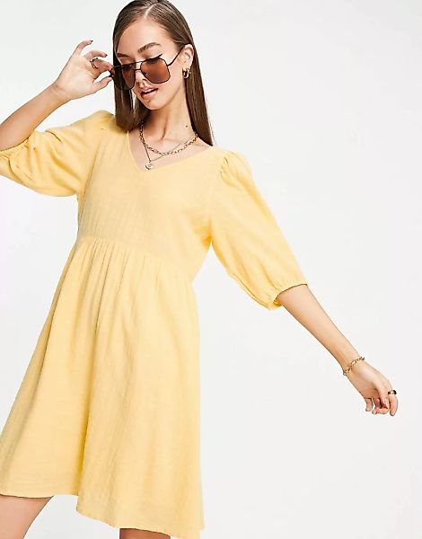 Vero Moda – Mini-Hängerkleid mit überkreuztem Detail auf dem Rücken in Gelb günstig online kaufen