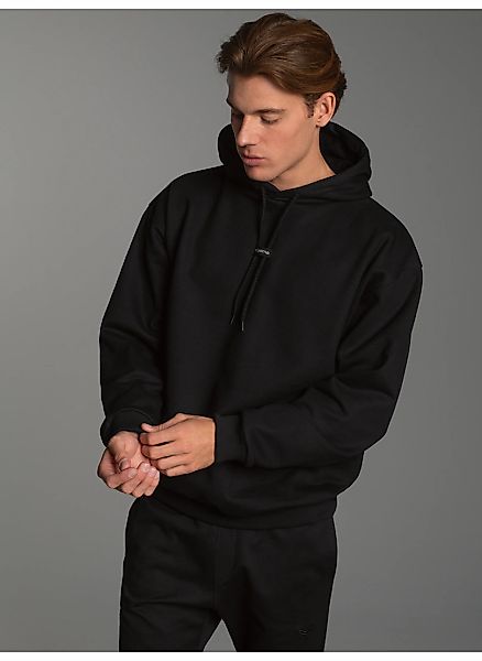 Trigema Kapuzensweatshirt "TRIGEMA Hoodie mit modischem Logo-Weblabel" günstig online kaufen