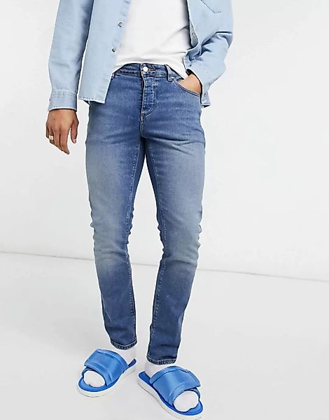 ASOS DESIGN – Schmale Stretch-Jeans in mittelblauer Vintage-Waschung günstig online kaufen