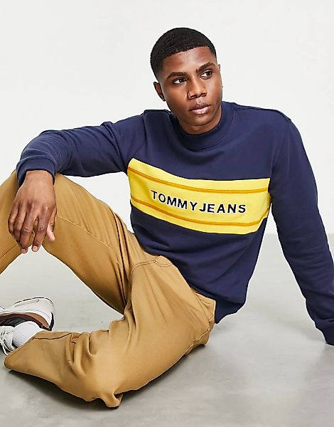 Tommy Jeans – Sweatshirt in Marineblau mit gestreiftem Brust-Logo im Farbbl günstig online kaufen