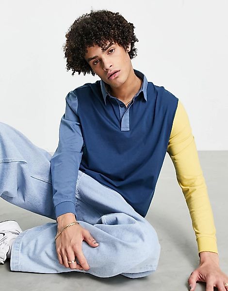 ASOS DESIGN – Lässiges, langärmeliges Polohemd mit Farbblockdesign in Blau günstig online kaufen