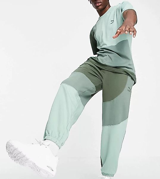 PUMA – Convey – Jogginghose in Grün mit Blockfarbendesign – exklusiv bei AS günstig online kaufen