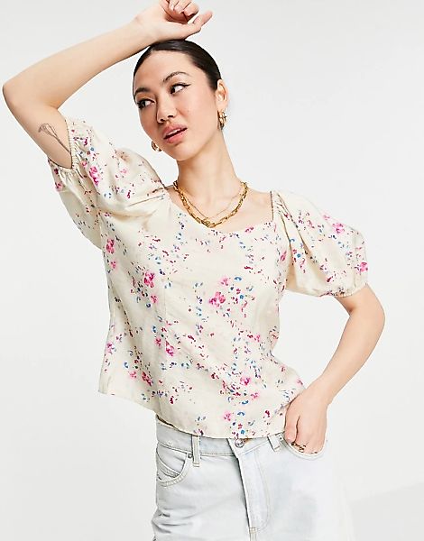 Vero Moda – Geblümte Bluse mit Puffärmeln und Rückenschnürung in Creme-Mehr günstig online kaufen