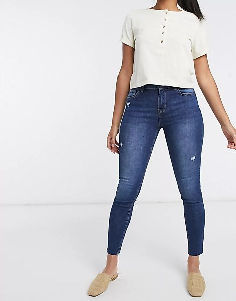 Bershka – Enge Push-up-Jeans mit offenem Saum in Dunkelblau günstig online kaufen