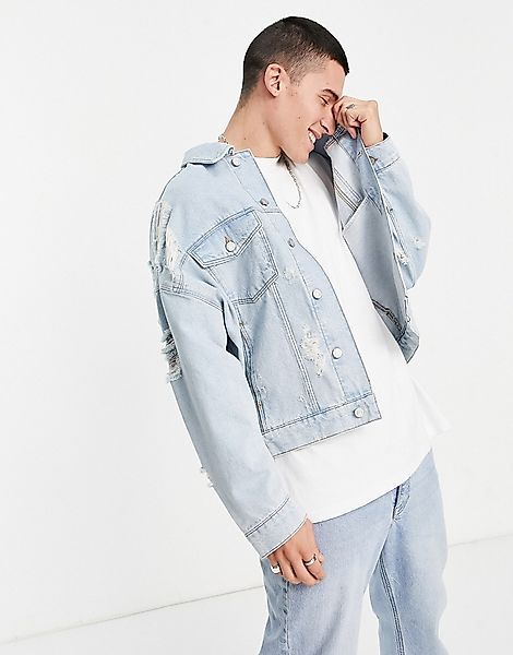 ASOS DESIGN – Oversize-Jeansjacke in mittelblauer Waschung mit Zierrissen günstig online kaufen