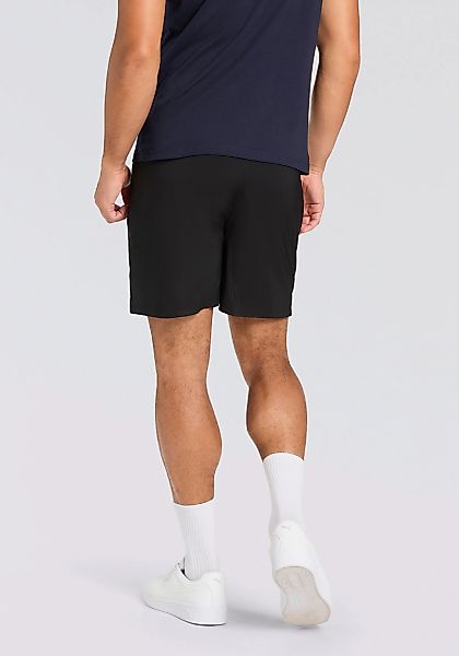 PUMA Trainingsshorts "M TAD FOUNDATIONS 7" WOVEN SHORT W/ ZIP POCKETS" günstig online kaufen