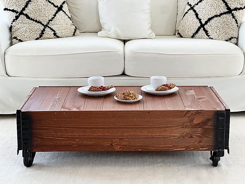 Vintage Couchtisch dunkelbraun aus massivem Holz mit Rollen günstig online kaufen