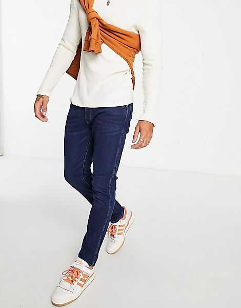 Wrangler – Larston – Jeans mit schmalem Schnitt-Blau günstig online kaufen