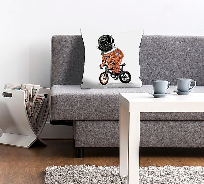 queence Dekokissen "Spacedog" mit einem fahrradfahrenden Astronauten-Hund günstig online kaufen