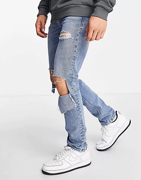 Versace Jeans Couture – Jeans in schmaler Passform mit Zierrissen an den Kn günstig online kaufen